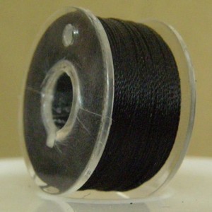 Extra strong, waxed stringing thread