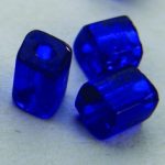 Prism shaped glass bead