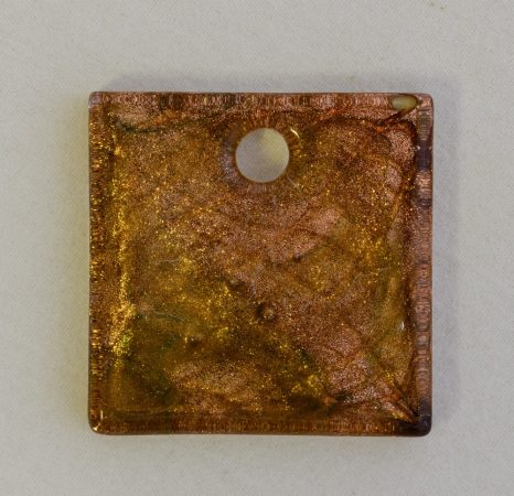 Glass pendant, green-mauve-silver-gold rombus